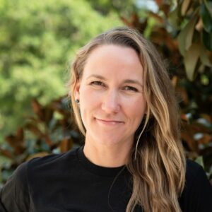 Professional headshot of Maddy Roche